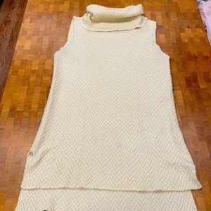 Cream turtle neck sweater tank.